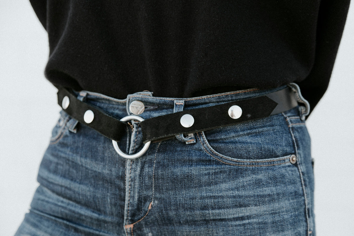 handmade black leather belt with silver snap buttons and o-ring closure